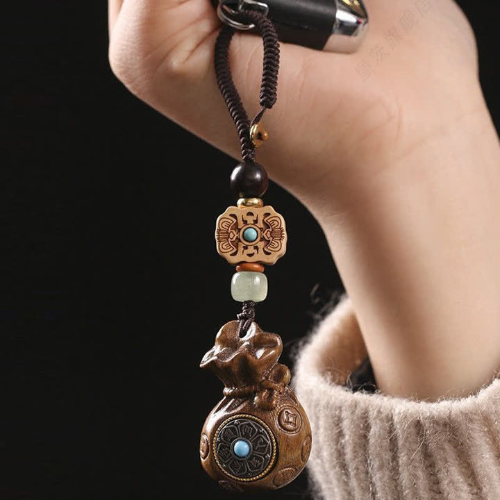 Buddha Stones Porte-clés Sérénité en bois de santal rouge et vert, symbole de bénédiction Om Mani Padme Hum, avec pièces de monnaie chinoises. - image 6