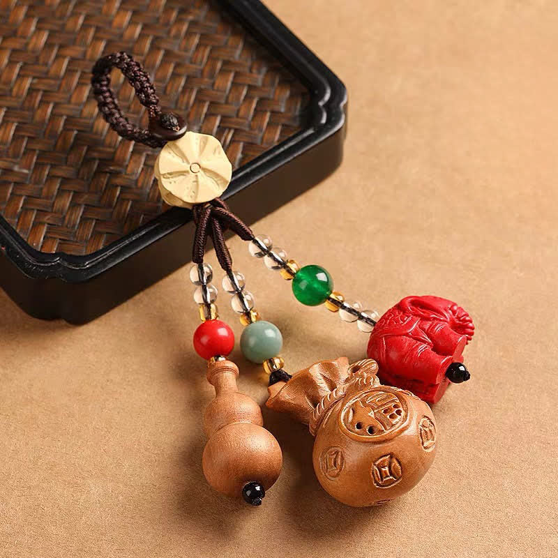 Buddha Stones Porte-clés porte-monnaie en bois de pêcher, personnage Fu, sac à argent, porte-clés éléphant en cinabre et calebasse de lotus - image 1