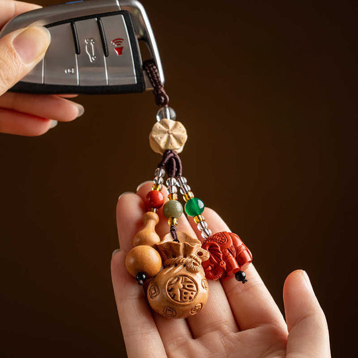 Buddha Stones Porte-clés porte-monnaie en bois de pêcher, personnage Fu, sac à argent, porte-clés éléphant en cinabre et calebasse de lotus - image 4