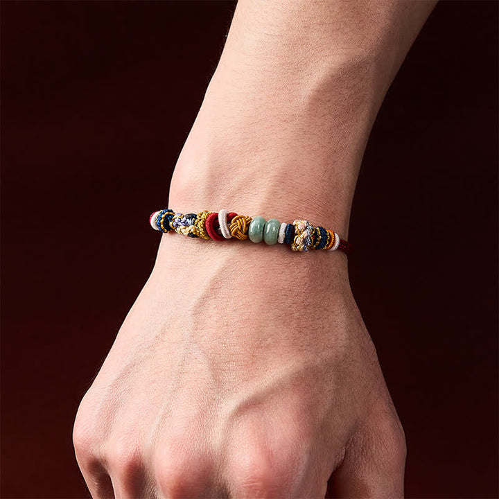 Buddha Stones Bracelet en cordon rouge et bleu marine avec perles de jade porte-bonheur en forme de fleur de pêcher tissées à la main - image 5