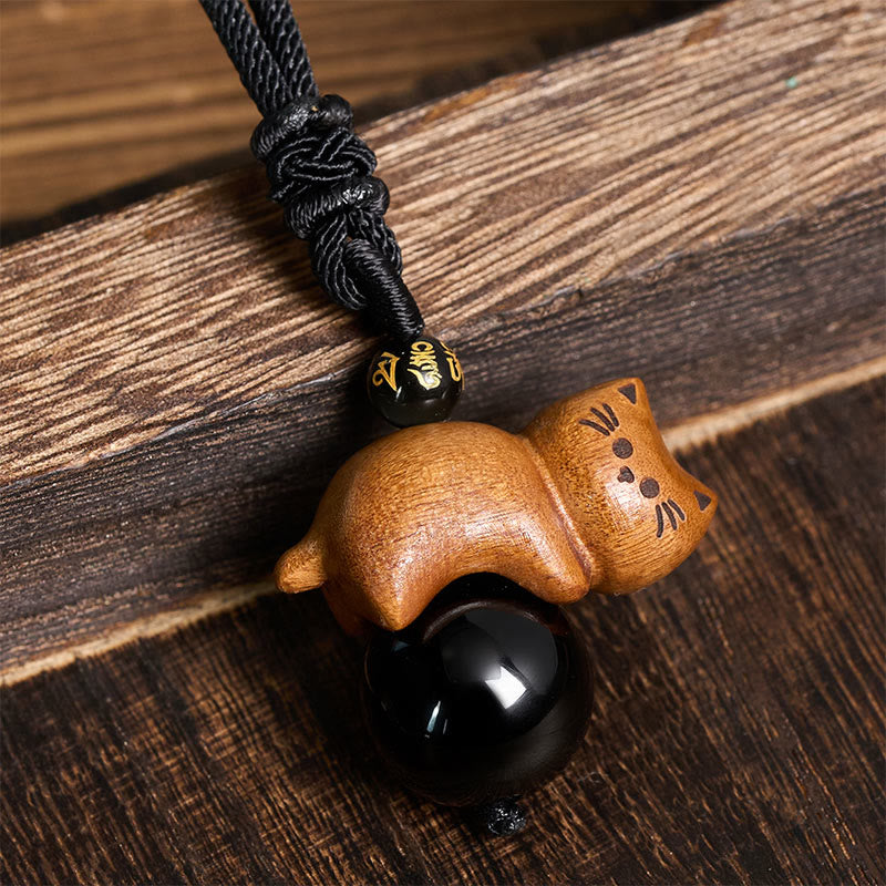 Buddha Stones Collier de protection en corde avec perle Om Mani Padme Hum et perle en obsidienne noire et bois de santal, orné d'un chat et d'une perle Om Mani Padme Hum. - image 1