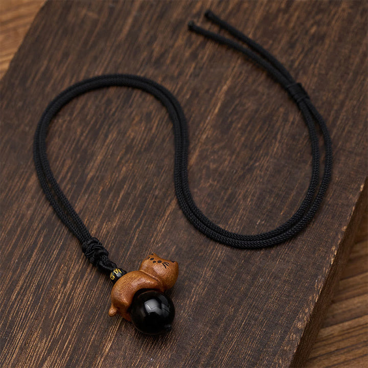 Buddha Stones Collier de protection en corde avec perle Om Mani Padme Hum et perle en obsidienne noire et bois de santal, orné d'un chat et d'une perle Om Mani Padme Hum. - image 4