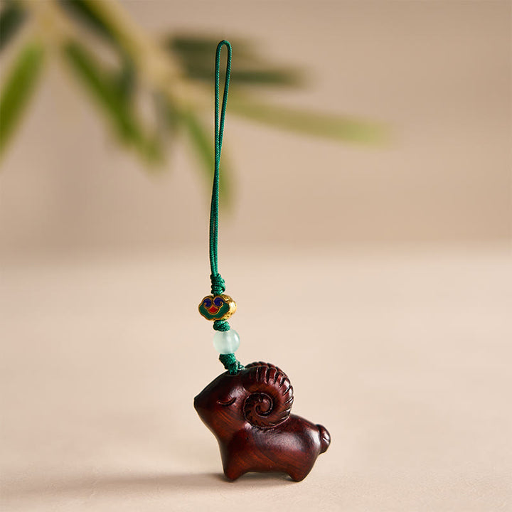 Buddha Stones Porte-clés chèvre en bois de santal sculpté à la main - Rouge foncé - image 14