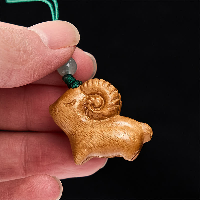 Buddha Stones Porte-clés chèvre en bois de santal sculpté à la main - image 12