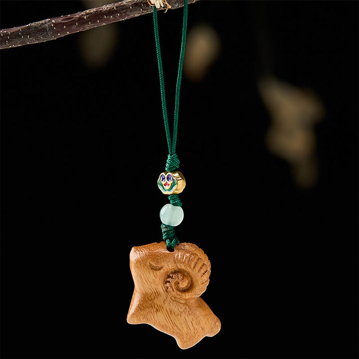 Buddha Stones Porte-clés chèvre en bois de santal sculpté à la main - image 9