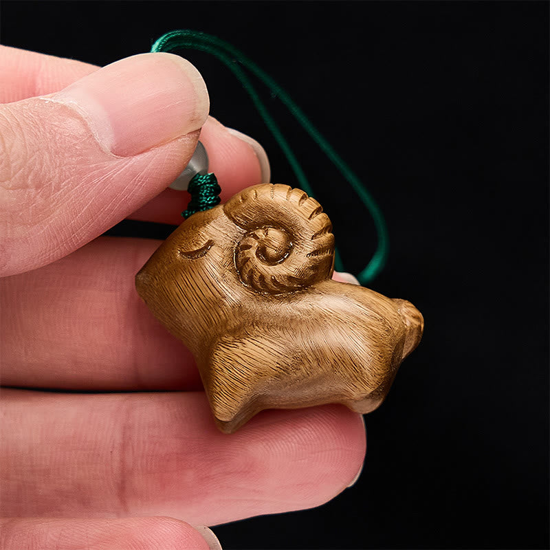 Buddha Stones Porte-clés chèvre en bois de santal sculpté à la main - image 4