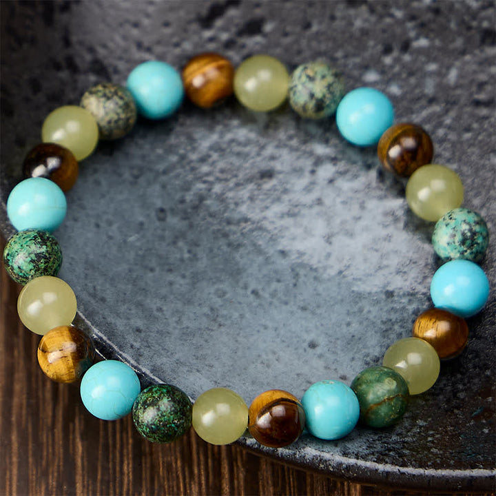 Buddha Stones Bracelet de protection en perles de jade turquoise cyan œil de tigre naturel - image 1
