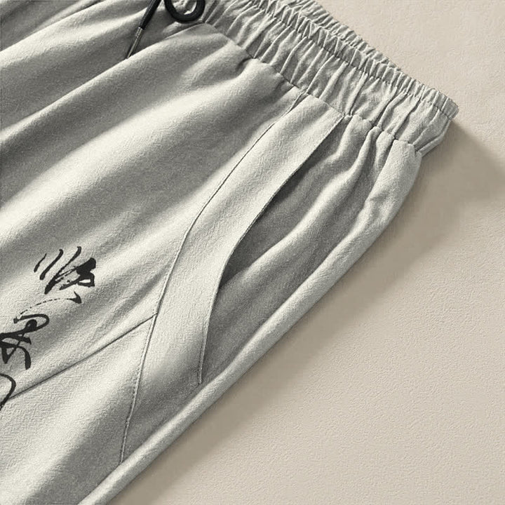 Buddha Stones Pantalon fuselé pour homme en pur coton, motif calligraphique de fleurs de prunier, cordon de serrage et poches - image 4
