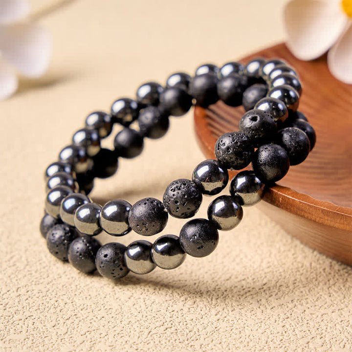 Buddha Stones Bracelet minimaliste en perles d'hématite et de lave, symbole d'ancrage - image 2