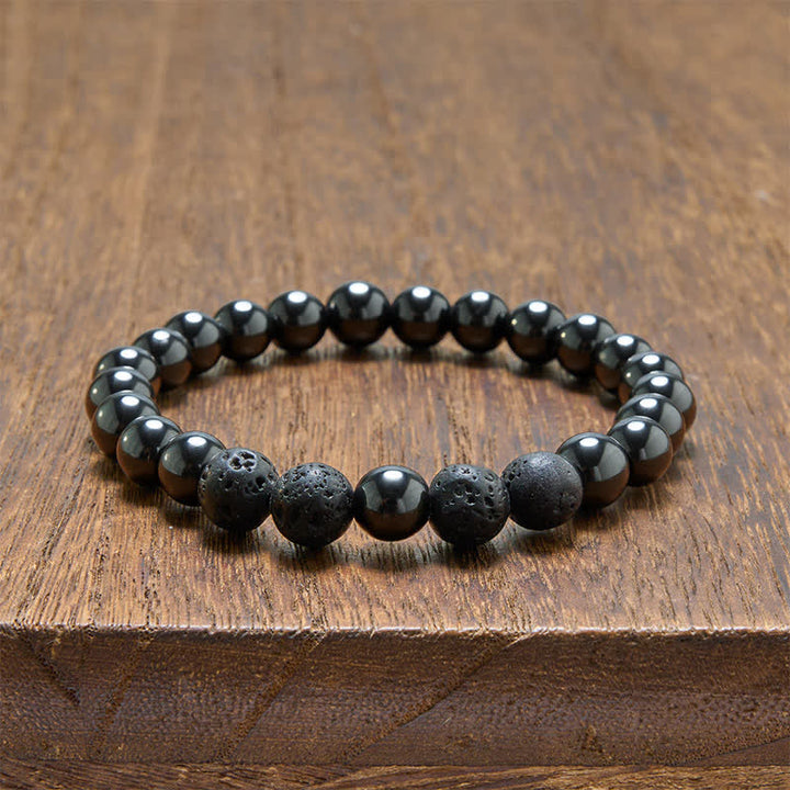 Buddha Stones Bracelet minimaliste en perles d'hématite et de lave, symbole d'ancrage - image 9