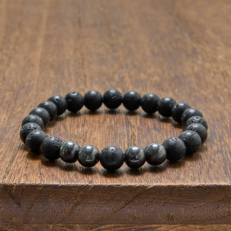 Buddha Stones Bracelet minimaliste en perles d'hématite et de lave, symbole d'ancrage - image 10