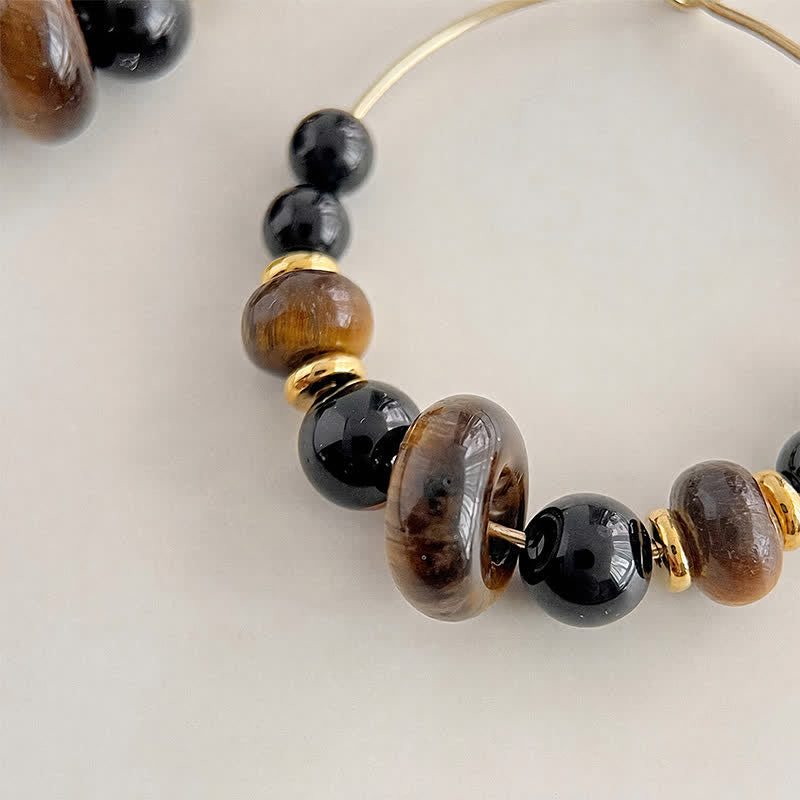 Buddha Stones Boucles d'oreilles créoles de protection en œil de tigre et onyx noir - image 2