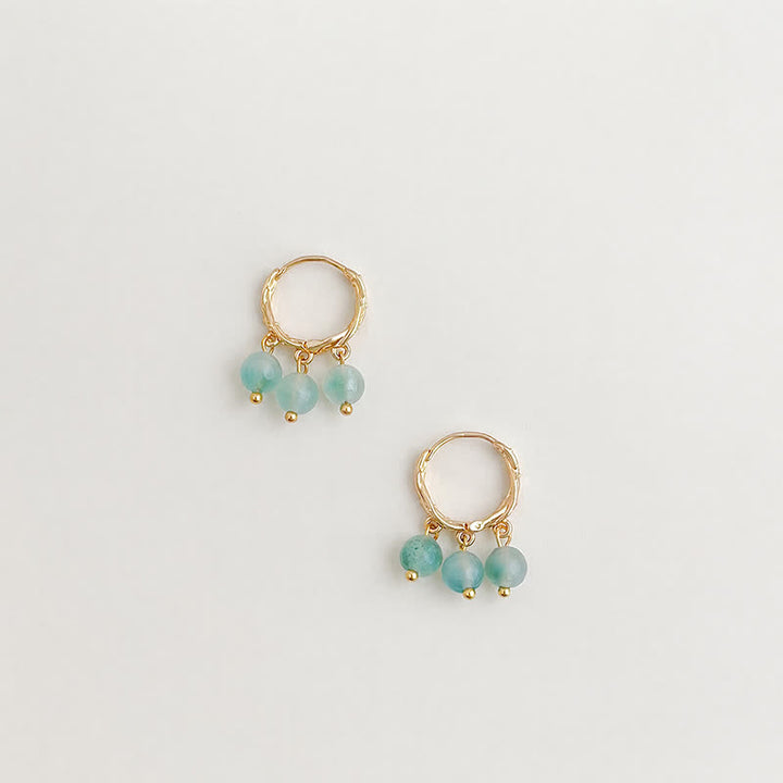 Buddha Stones Boucles d'oreilles apaisantes en cuivre et agate mousse naturelle - image 1