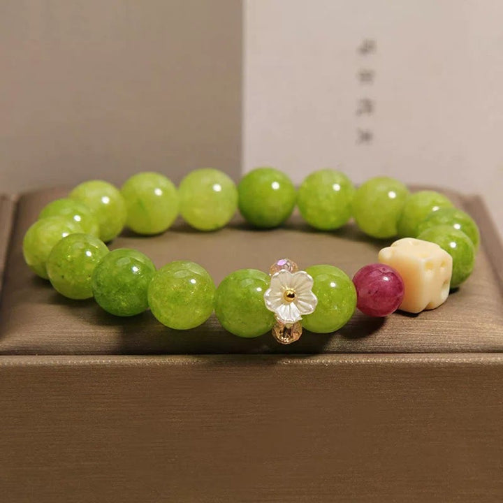 Buddha Stones Bracelet de perles de guérison avec breloque fleur de péridot - image 7