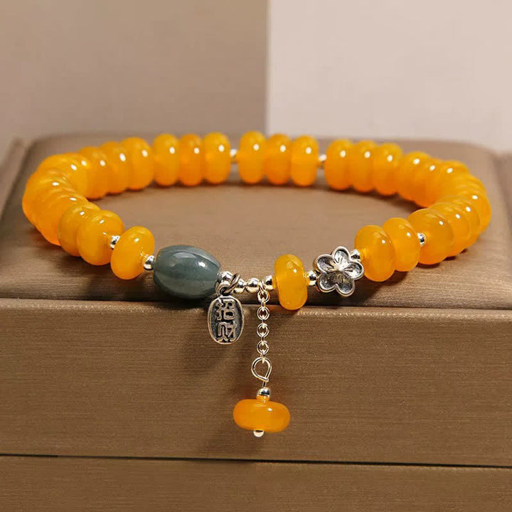 Buddha Stones Bracelet porte-bonheur en agate jaune et verte, symbole de prospérité - Perle de boulier en agate jaune (Tour de poignet : 16–17 cm) - image 0