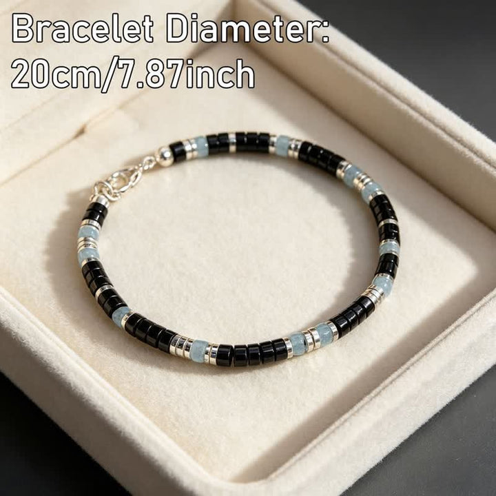 Buddha Stones Bracelet extensible de protection en perles d'onyx noir et de calcédoine bleue - image 2