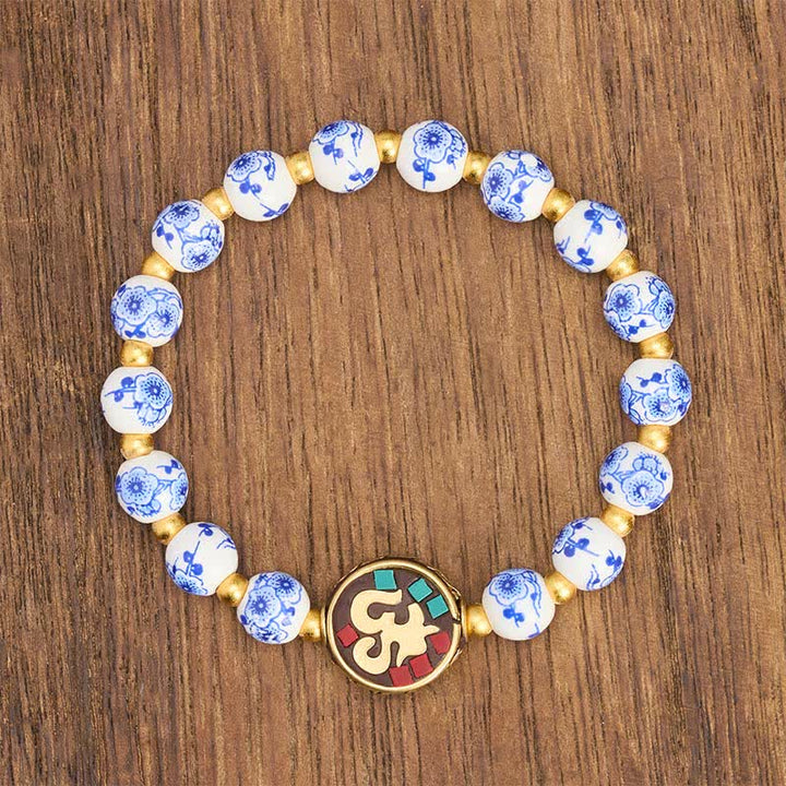 Buddha Stones Bracelet de perles de compassion OM en porcelaine bleue et blanche et cuivre - image 2