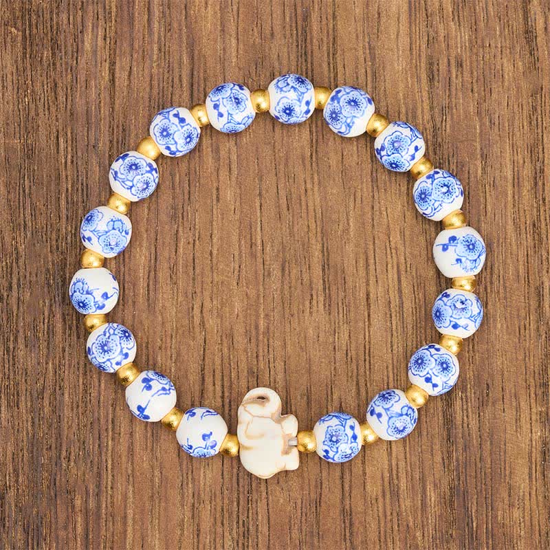 Buddha Stones Bracelet en porcelaine blanche à perles rondes en forme d'éléphant et de motif floral - image 1