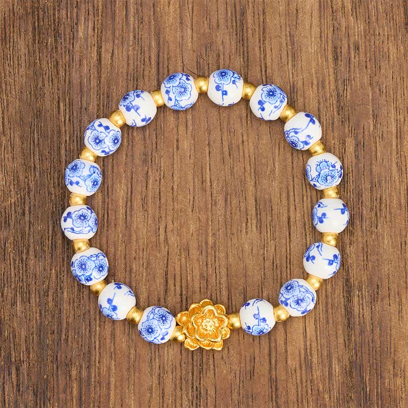 Buddha Stones Bracelet rond en porcelaine blanche orné d'un lotus et de perles symbolisant l'illumination - image 1