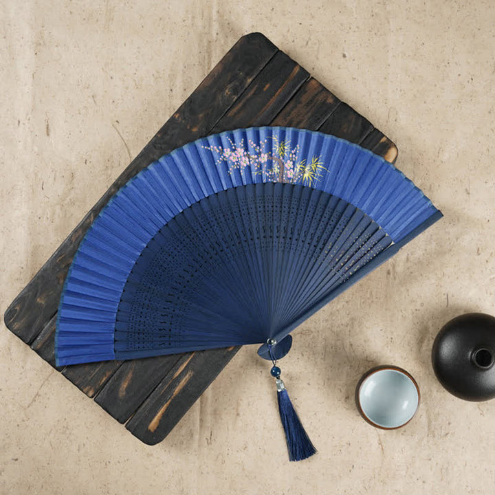 Éventail pliable en bambou à main avec gravure simple et creuse en forme de fleur de cerisier avec Buddha Stones - Bleu foncé 22 cm - image 10