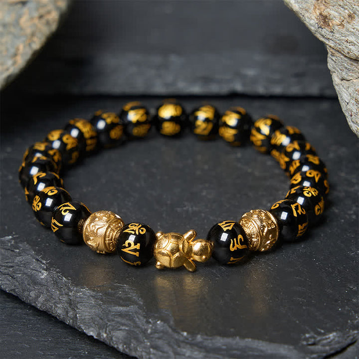 Buddha Stones Bracelet Om Mani Padme Hum en perles d'onyx noir naturel, symbole de la force de la tortue - Onyx noir 8 mm (Tour de poignet : 15–16 cm) - image 0