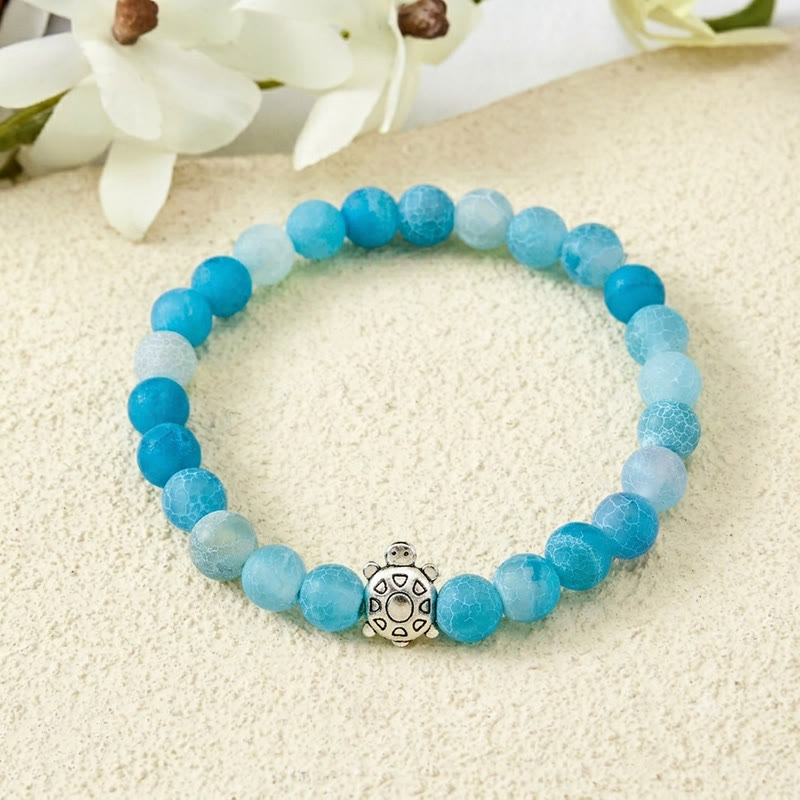 Buddha Stones Bracelet de perles en agate bleue craquelée, tortue calme - Agate craquelée bleue (Tour de poignet : 15–16 cm) - image 0