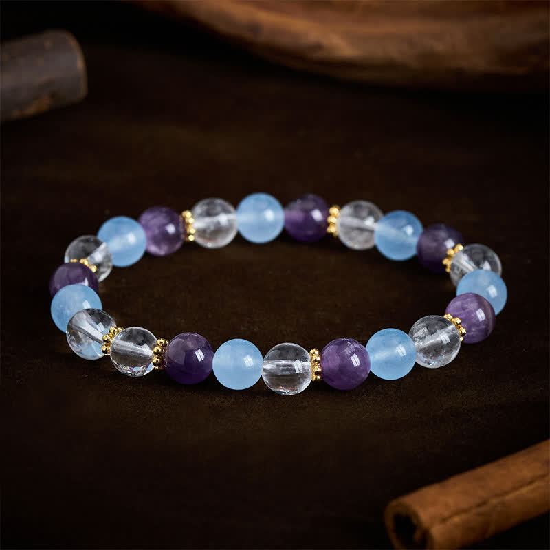 Buddha Stones Bracelet de protection en perles de quartz clair, améthyste et calcédoine bleue - image 1