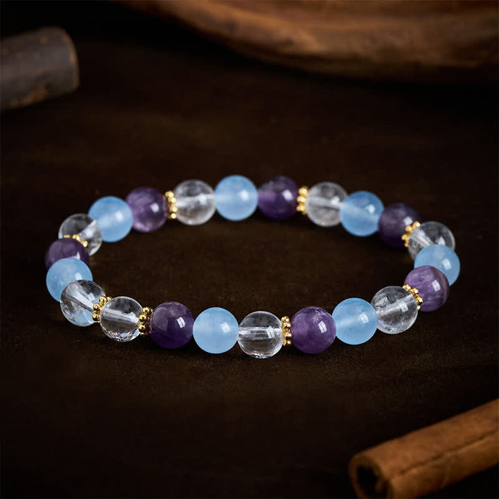 Buddha Stones Bracelet de protection en perles de quartz clair, améthyste et calcédoine bleue - image 1