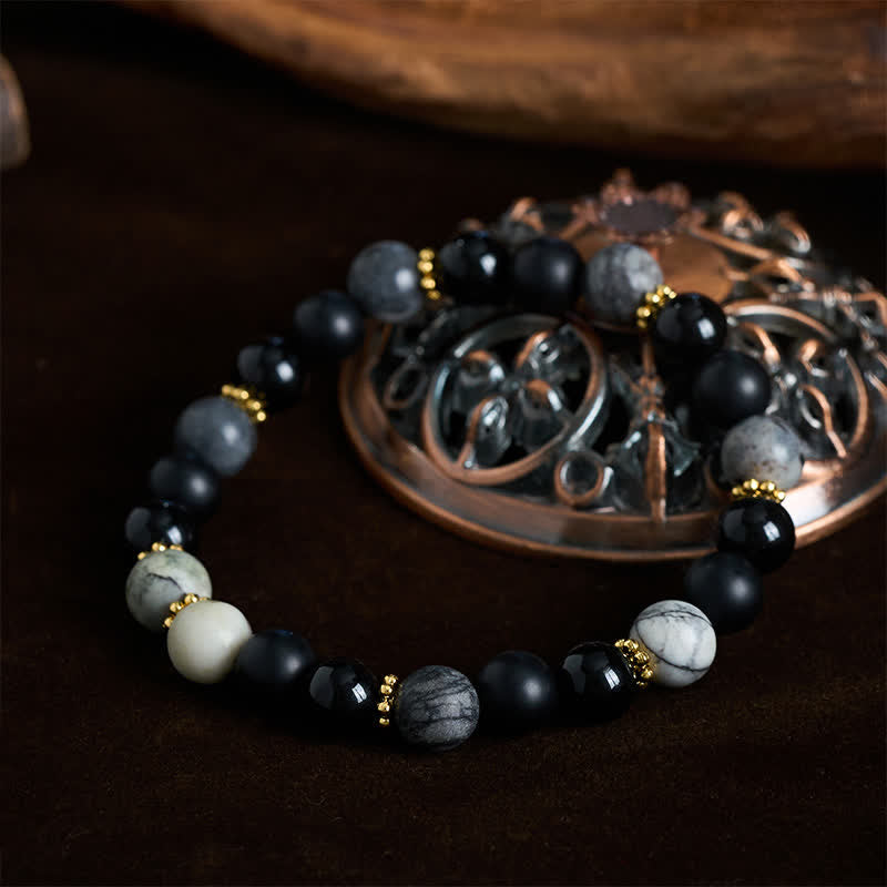 Buddha Stones Bracelet d'activation en perles de jaspe gris et d'obsidienne noire givrée - image 1