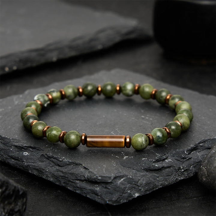 Buddha Stones Bracelet orné d'une perle ronde en agate mousse verte et d'un œil de tigre - image 1