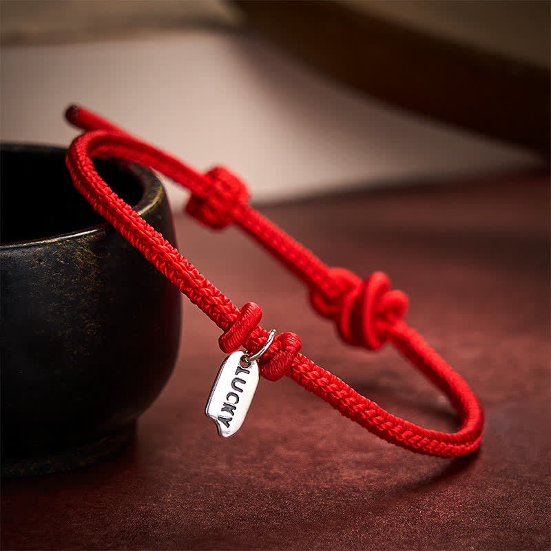 Buddha Stones Bracelet porte-bonheur ajustable en fil rouge tressé à la main - image 1