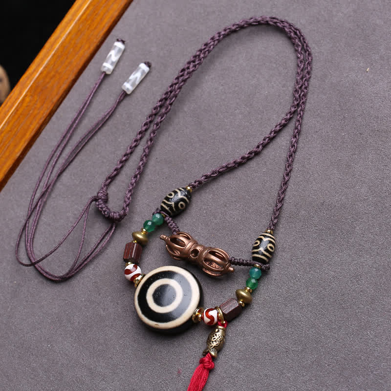 Buddha Stones Collier de protection en perles Dzi tibétaines Vajra à trois yeux et corde tressée - Environ 24 × 10 mm - image 0