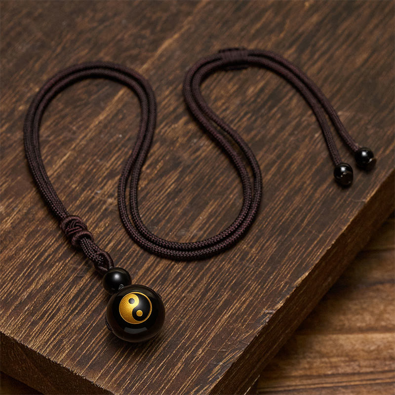 Buddha Stones Pendentif Yin Yang de purification en obsidienne noire sculptée, symbole de purification. - image 9