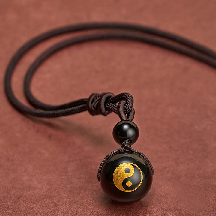 Buddha Stones Pendentif Yin Yang de purification en obsidienne noire sculptée, symbole de purification. - image 8