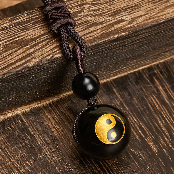Buddha Stones Pendentif Yin Yang de purification en obsidienne noire sculptée, symbole de purification. - image 7