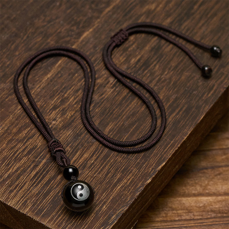 Buddha Stones Pendentif Yin Yang de purification en obsidienne noire sculptée, symbole de purification. - image 3