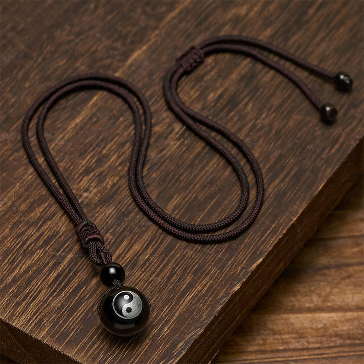 Buddha Stones Pendentif Yin Yang de purification en obsidienne noire sculptée, symbole de purification. - image 3