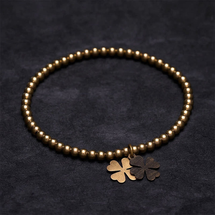 Buddha Stones Bracelet porte-bonheur en perles de cuivre avec breloque trèfle à quatre feuilles - 7,1–7,5 pouces (18–19 cm) - image 0