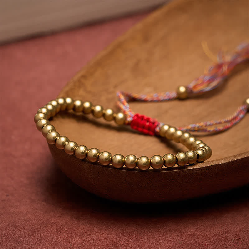 Buddha Stones Bracelet d'équilibre en perles de cuivre et fil rouge - image 1