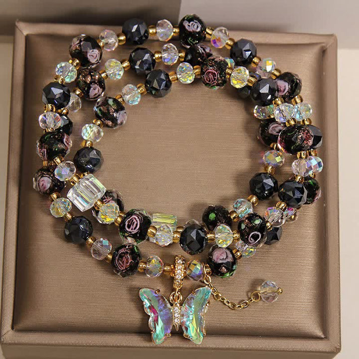 Buddha Stones Bracelet triple tour avec breloque papillon rose et perles de verre Liuli noires - image 1
