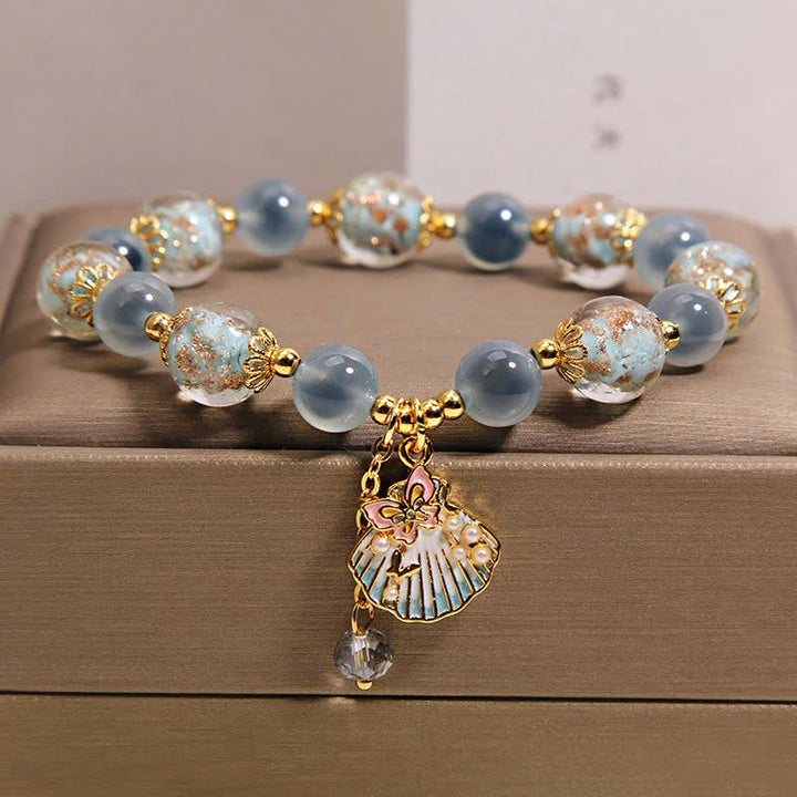 Buddha Stones Bracelet à breloques papillon en perles de verre Liuli et agate bonbon, coquillage et amour - Agate bonbon bleue (Tour de poignet : 15-16 cm) - image 0