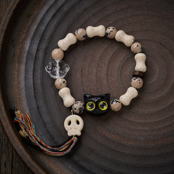 Buddha Stones Bracelet de courage avec motif crâne de chat et os - image 1