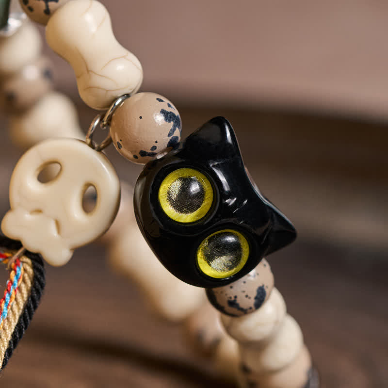Buddha Stones Bracelet de courage avec motif crâne de chat et os - image 4