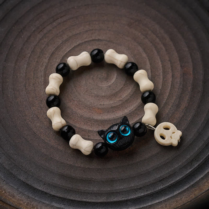 Buddha Stones Bracelet de force à perles avec crâne et chat noir - image 1