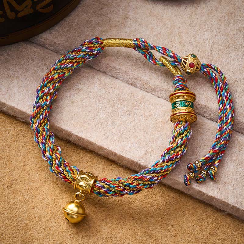 Buddha Stones Bracelet en corde tressée multicolore avec breloque clochette de force tibétaine Om Mani Padme Hum - Multicolore (Tour de poignet : 15–17 cm) - image 0