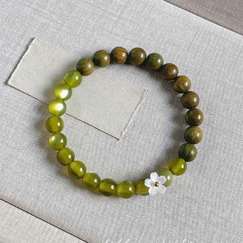 Buddha Stones Bracelet Sérénité avec breloque fleur œil-de-chat en bois de santal vert - Pierre œil-de-chat de 8 mm - image 13
