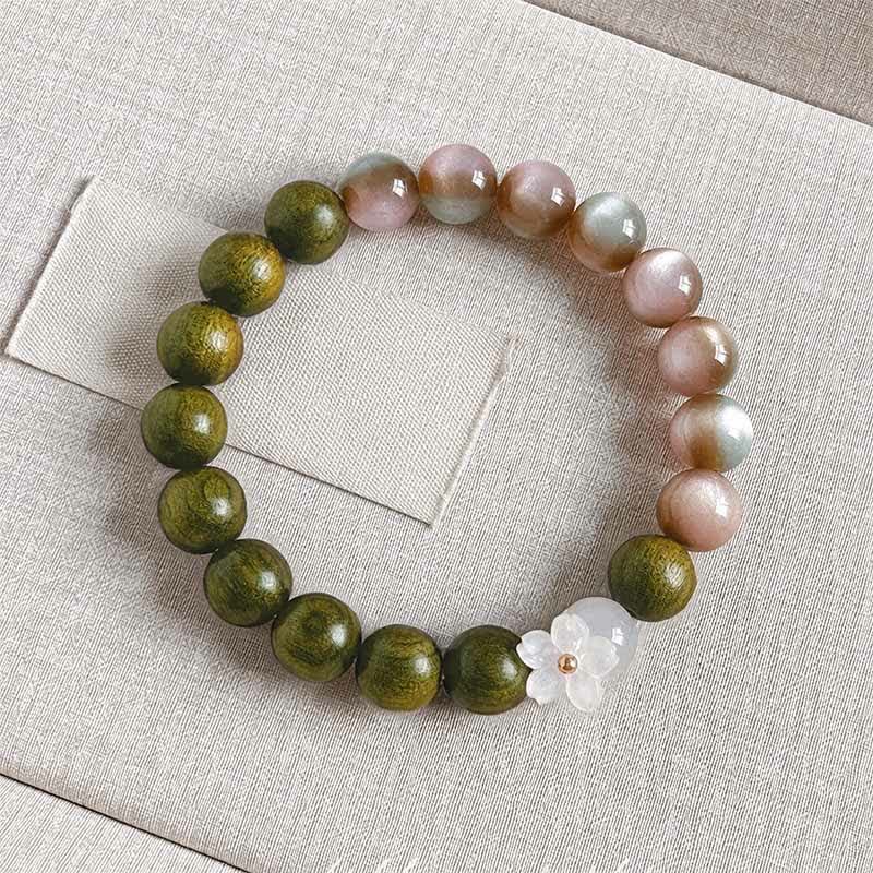 Buddha Stones Bracelet Sérénité avec breloque fleur œil-de-chat en bois de santal vert - Perles roses de 10 mm - image 8