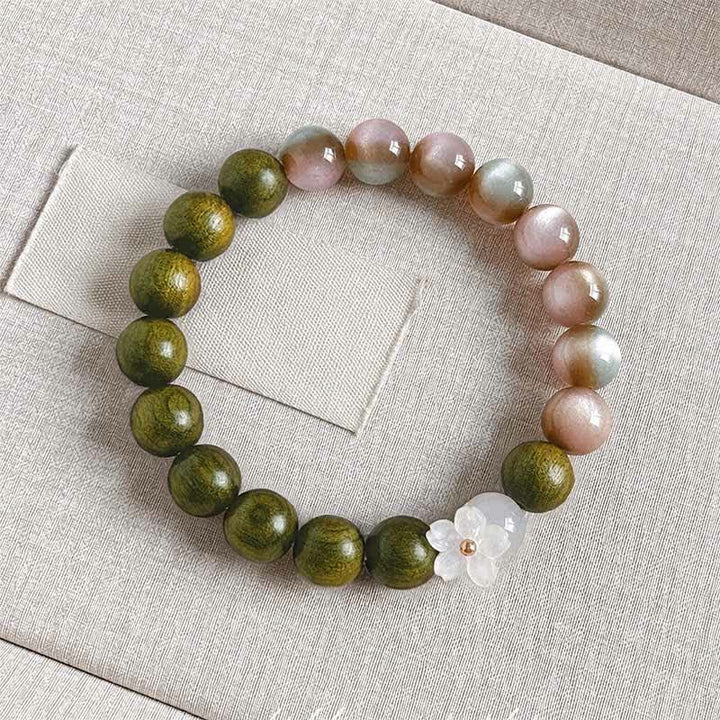 Buddha Stones Bracelet Sérénité avec breloque fleur œil-de-chat en bois de santal vert - Perles roses de 10 mm - image 8