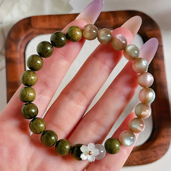Buddha Stones Bracelet Sérénité avec breloque fleur œil-de-chat en bois de santal vert - image 3