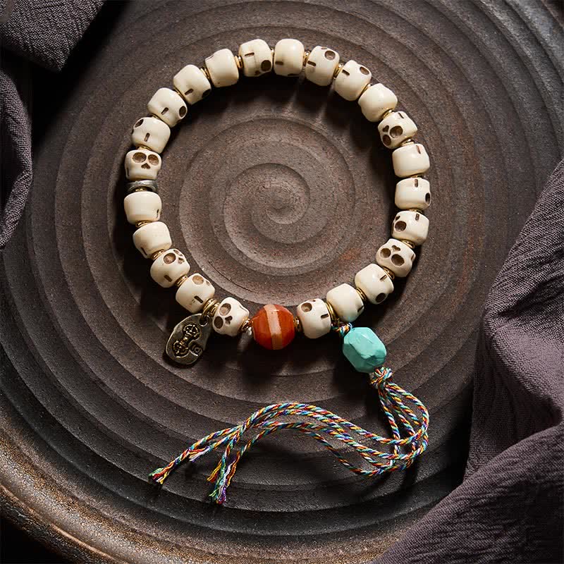 Buddha Stones Bracelet d'ancrage en perles d'os tibétaines, motif crâne du Seigneur de la Forêt des Cadavres - image 1